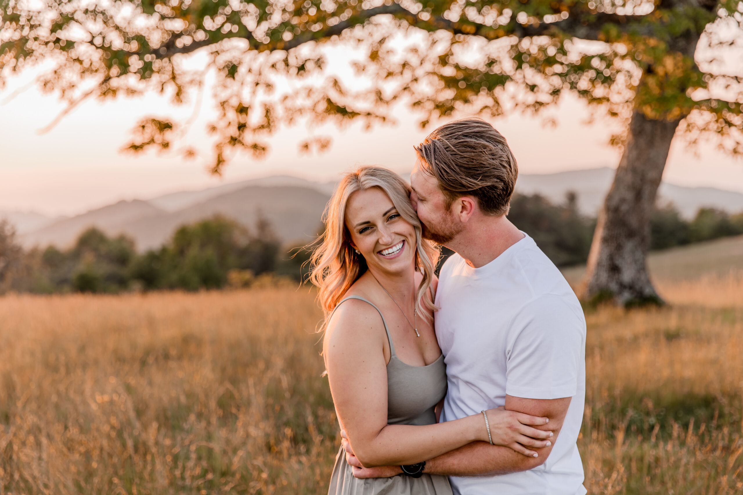 Blue Ridge Mountains sunset engagement with tall grass