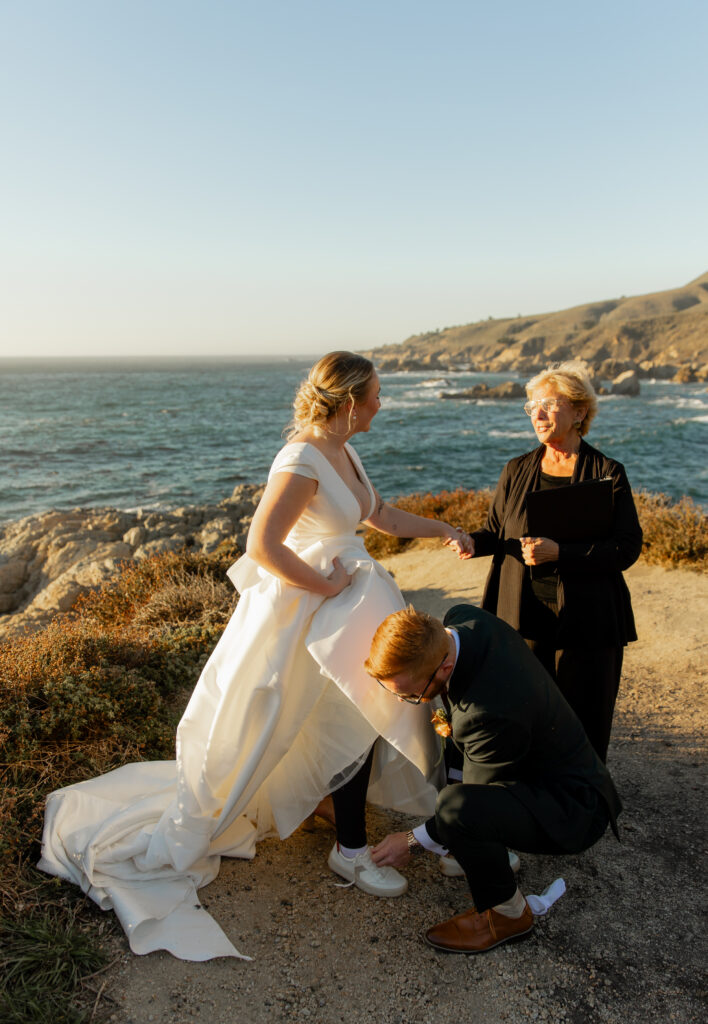 Couple exchanging vows at Garrapata State Park during Big Sur elopement ceremony
