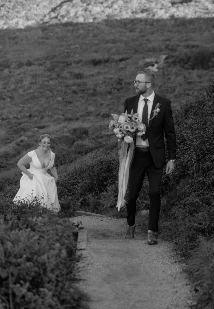 Couple walking along coastal trail at Garrapata State Park during Big Sur elopement