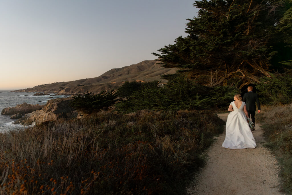 Couple walking along coastal trail at Garrapata State Park in Big Sur