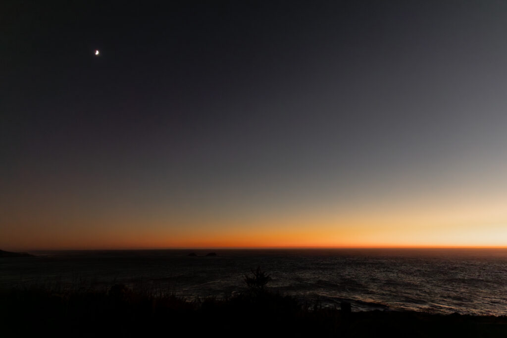 Sunset over the ocean in Big Sur after elopement