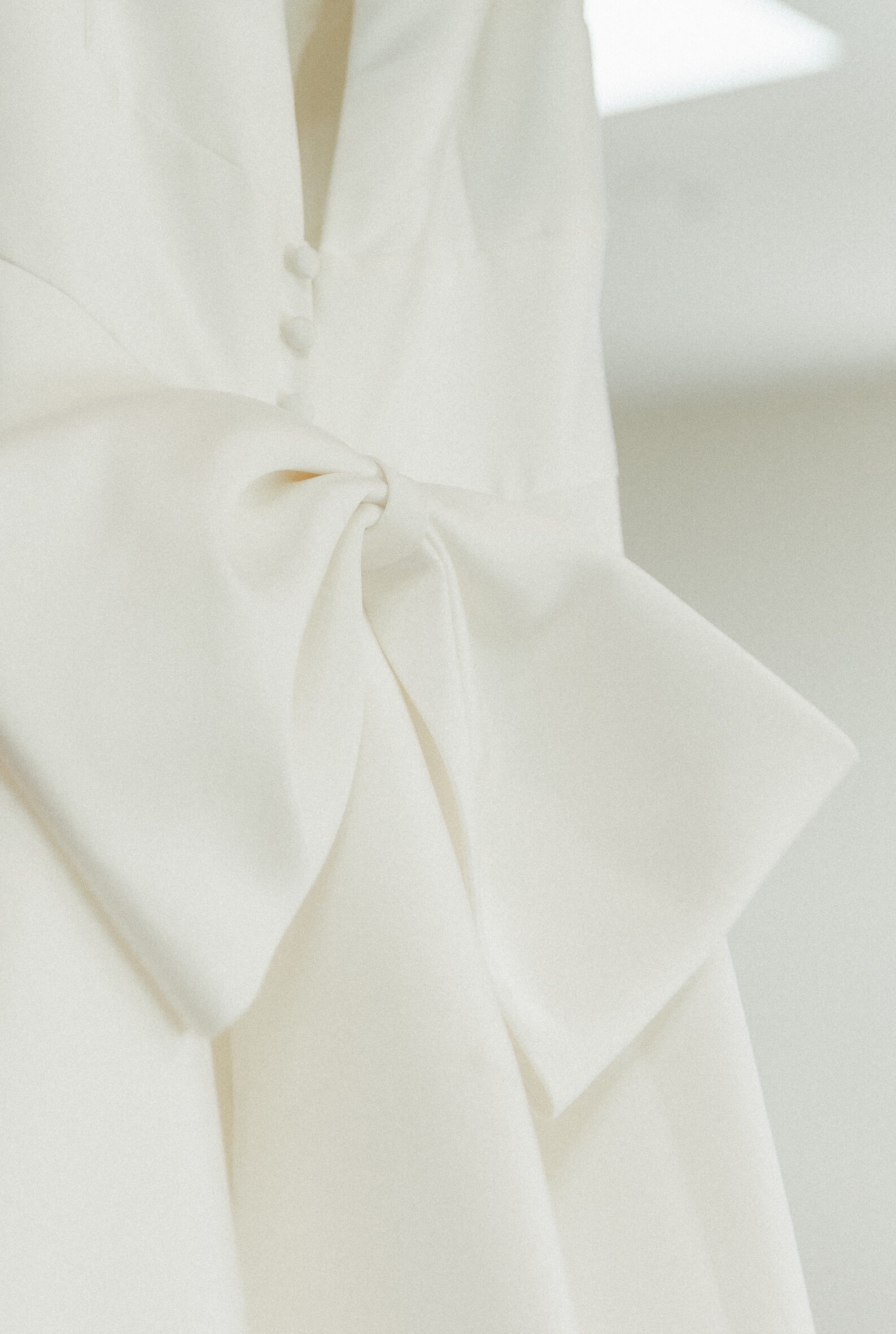 Wedding dress bow detail before Big Sur elopement