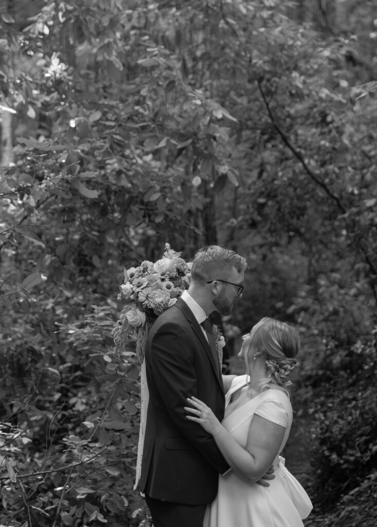 Intimate couple portrait in Big Sur redwoods during elopement