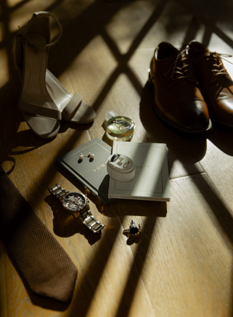 Wedding details including rings and accessories at Big Sur Airbnb before elopement