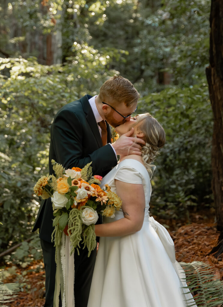 Intimate couple portrait in Big Sur redwoods during elopement