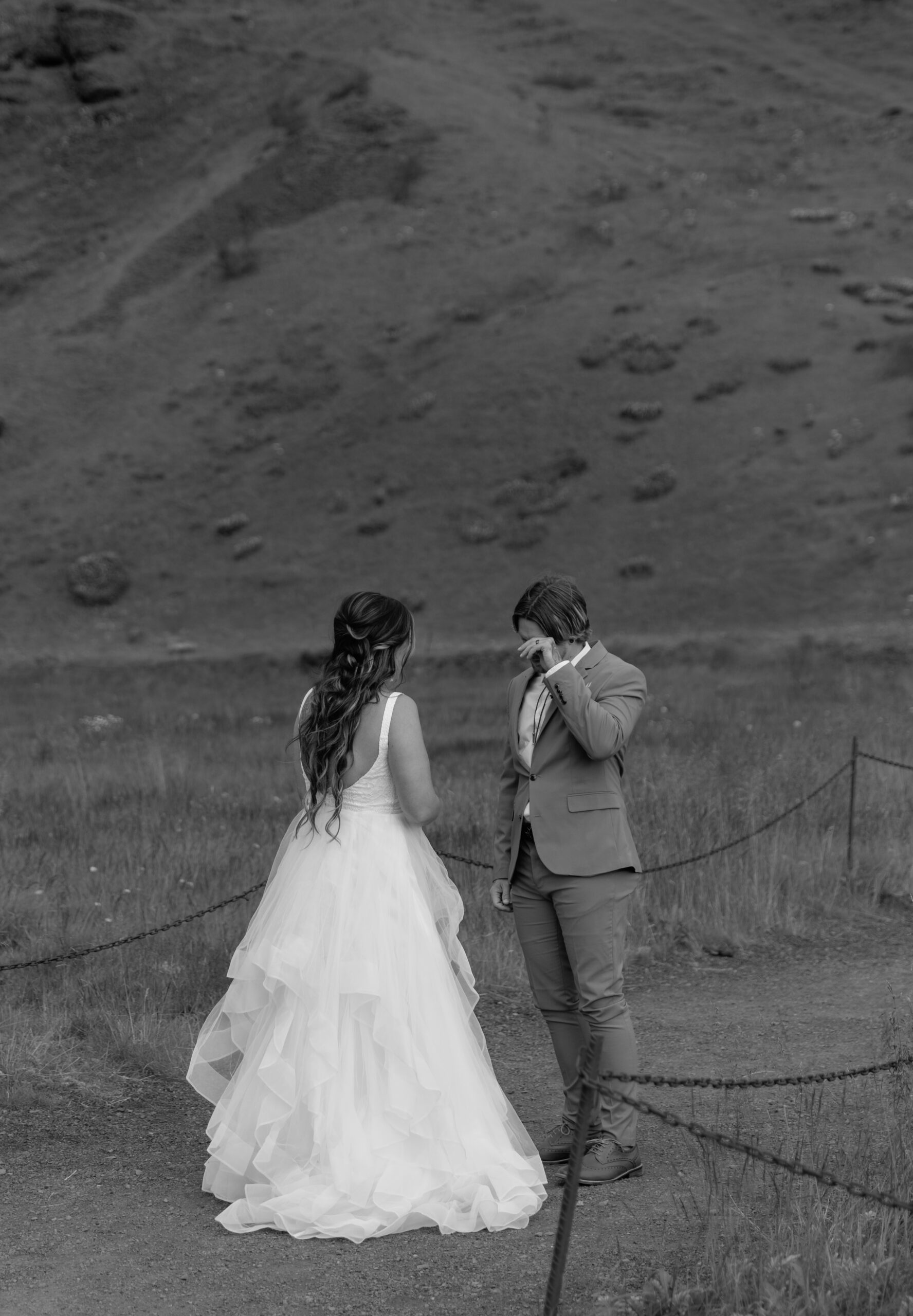 Black and white photo of emotional first look at Skógafoss waterfall in Iceland